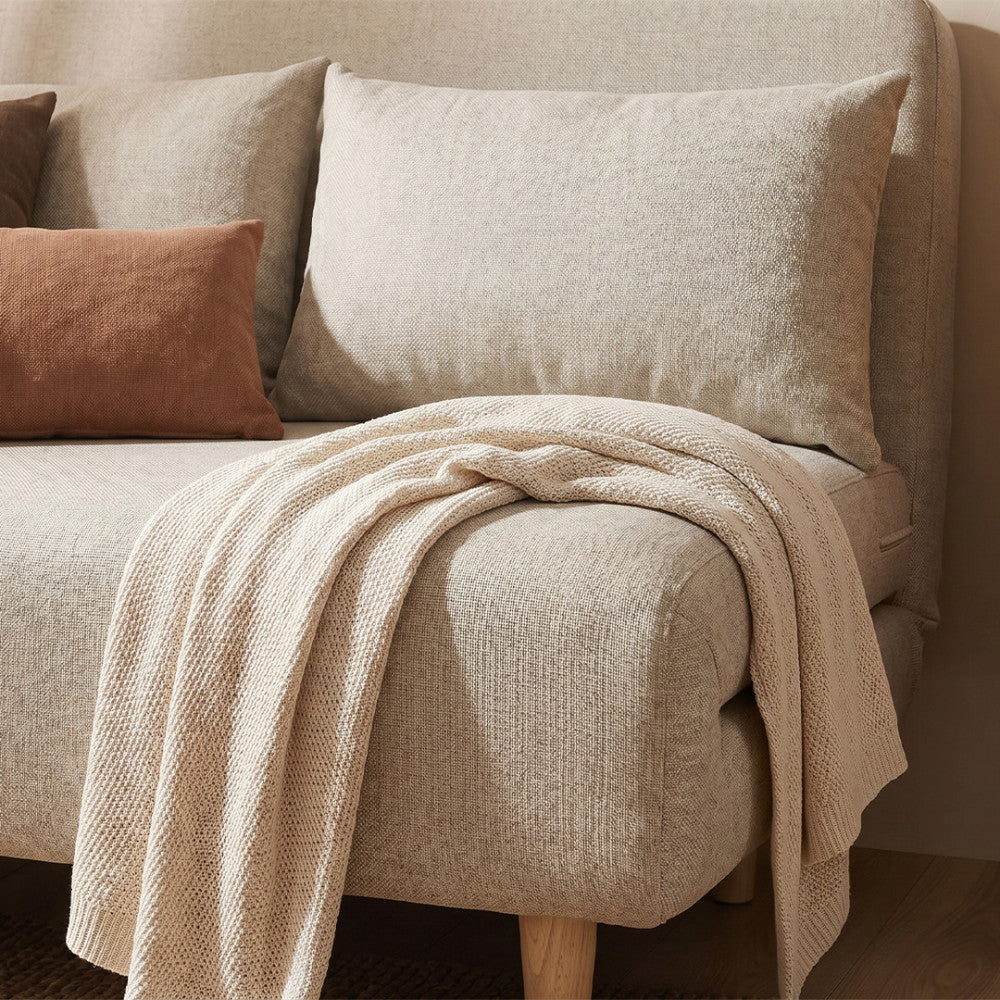 nella-sofa-cama-de-2-plazas-de-tela-con-patas-de-madera-clara__Beige