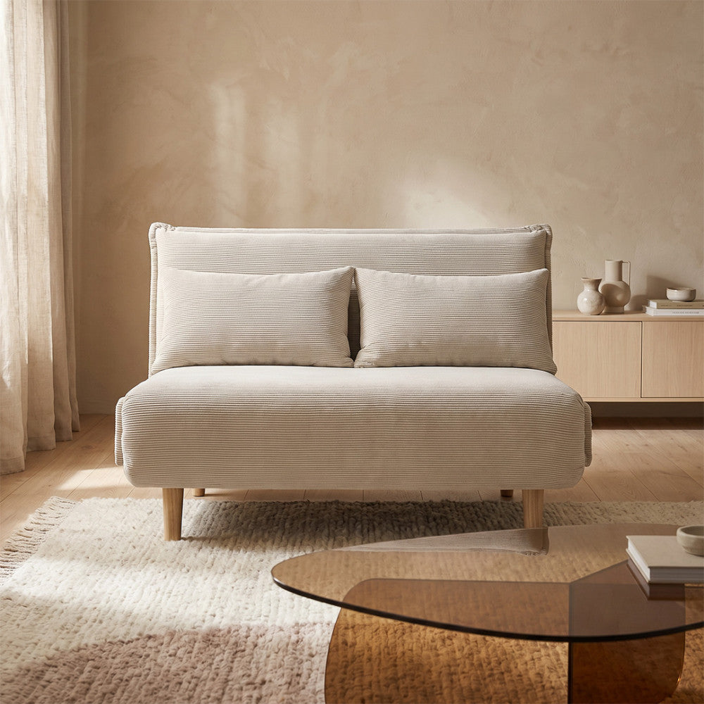 nella-sofa-cama-de-2-plazas-de-pana-con-patas-de-madera-clara__Beige